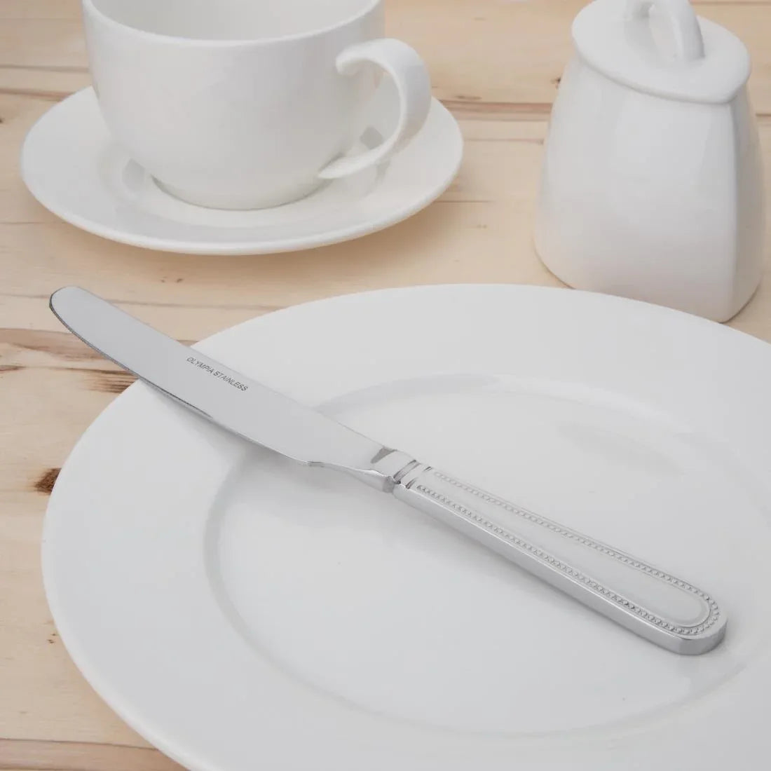 C125 Olympia Bead Solid Handle Table Knife (Pack of 12) - JD Catering Equipment Solutions Ltd